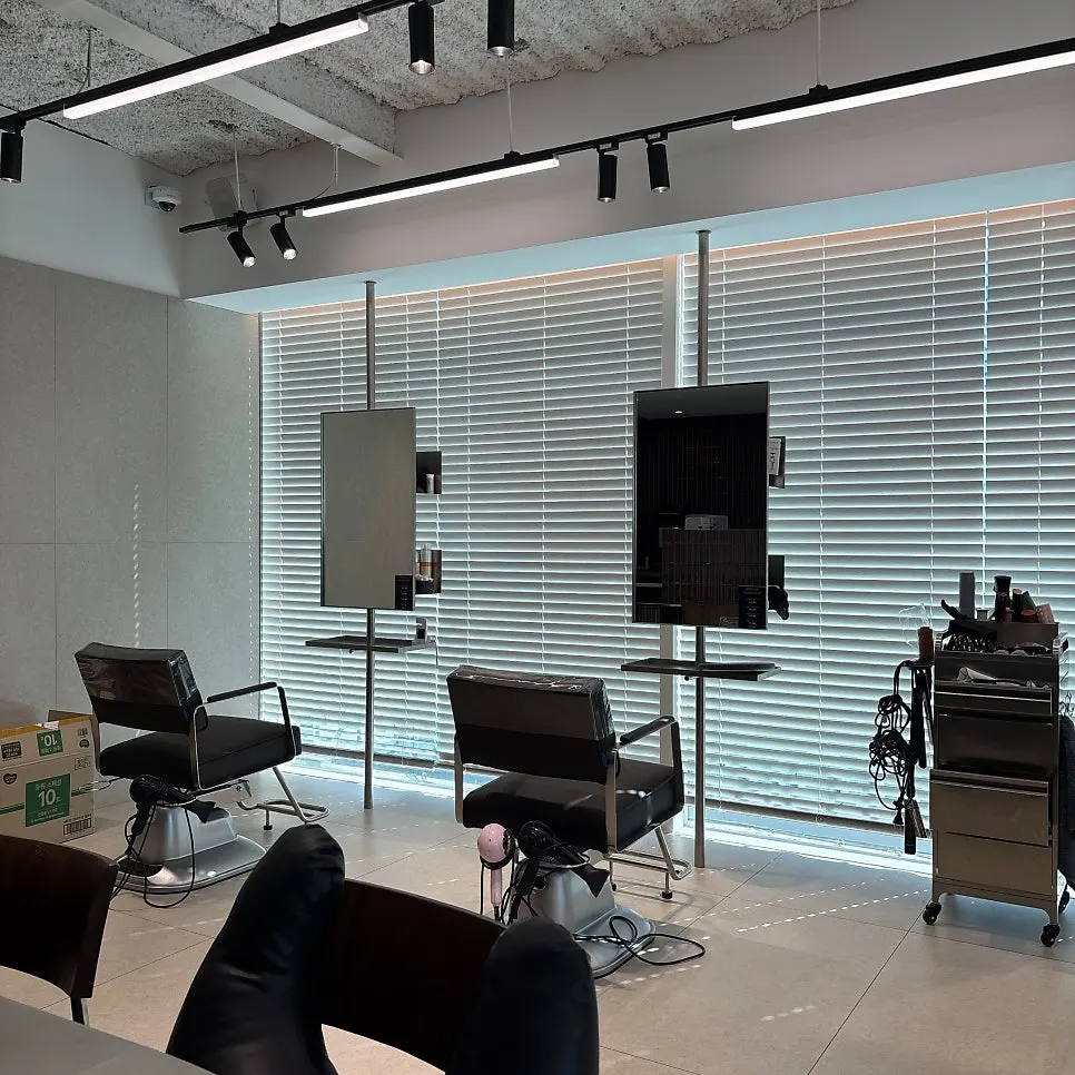 Clean salon interior with window-side seating