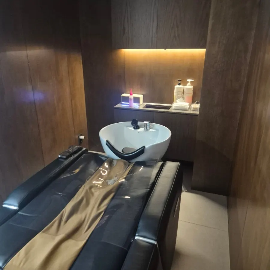 Private room with a massage chair for care