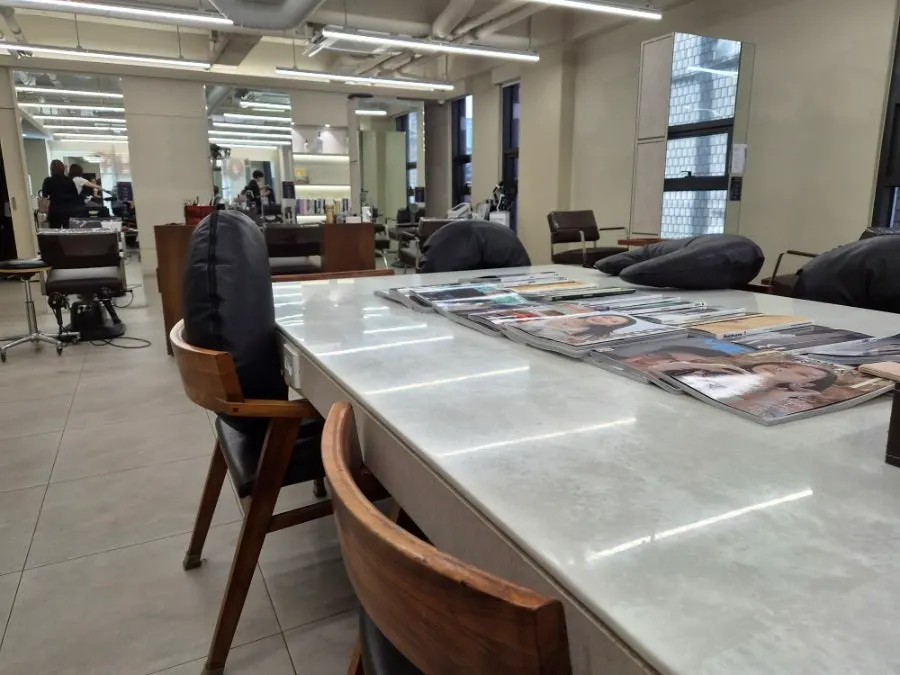 Salon treatment area with wide spacing between seats