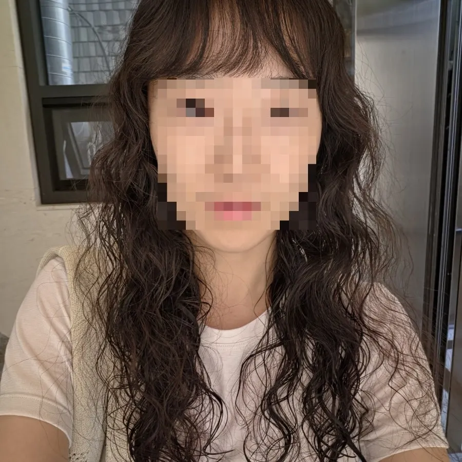 Hippie perm finished with C-curl bangs