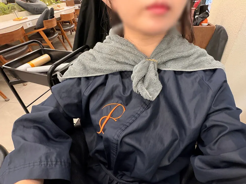 Clothes protection process using towels and plastic wrap