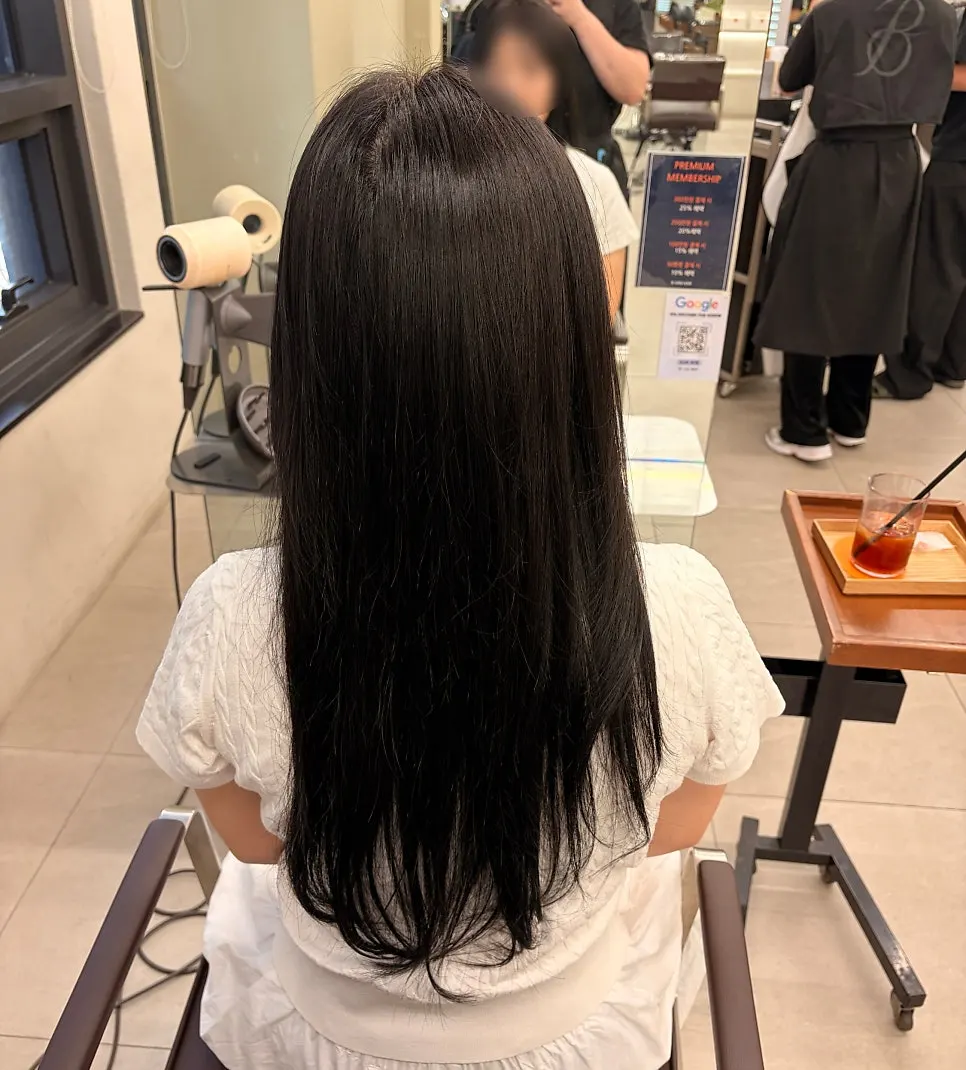 Mocha tone-down hair finished with blow-dry