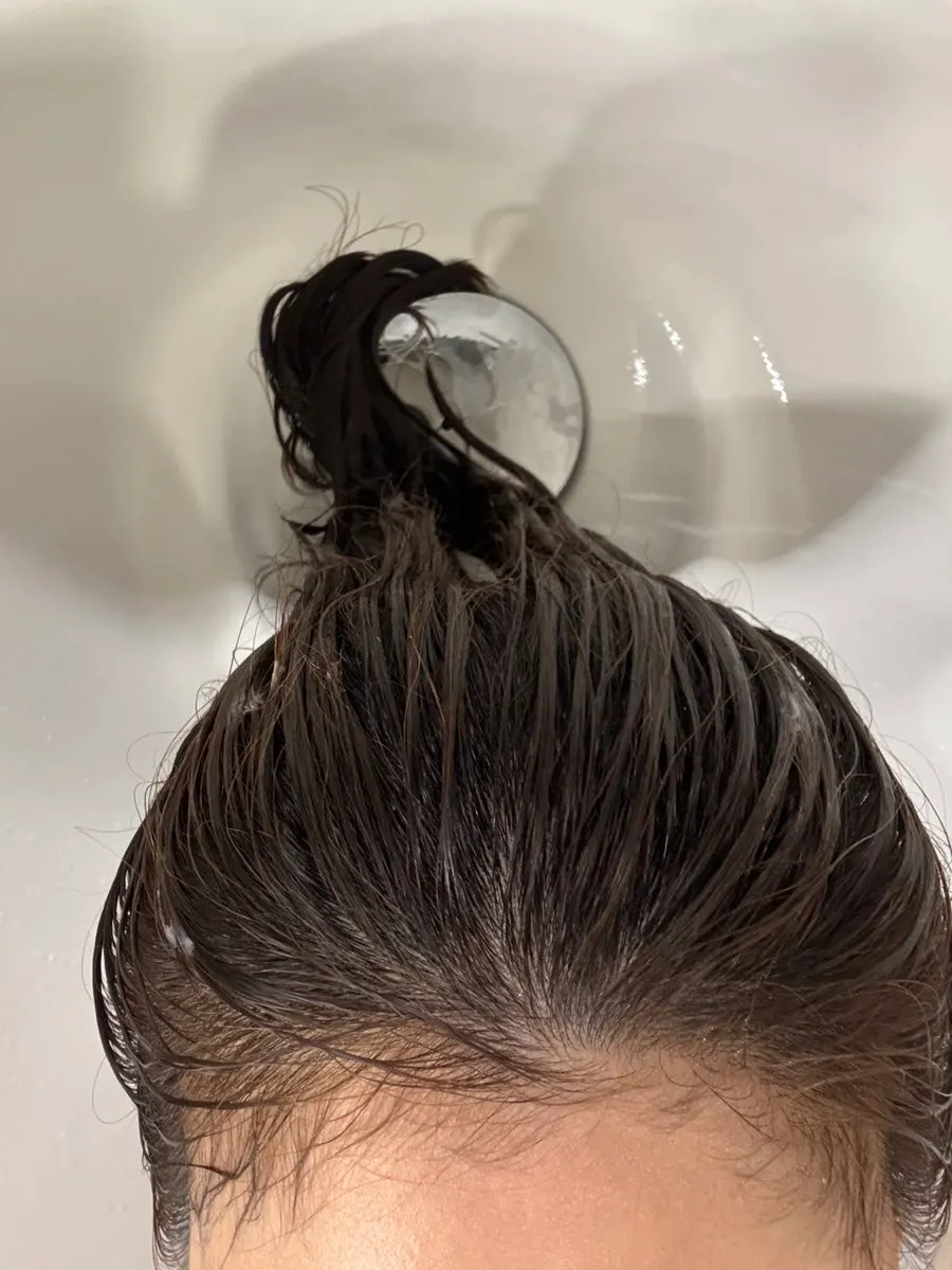 Shampoo process with a face cover on