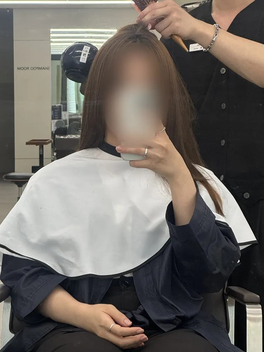 Thinning and side bangs cutting in progress