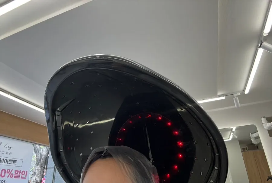 Process of smoothing the hair during the straight perm treatment