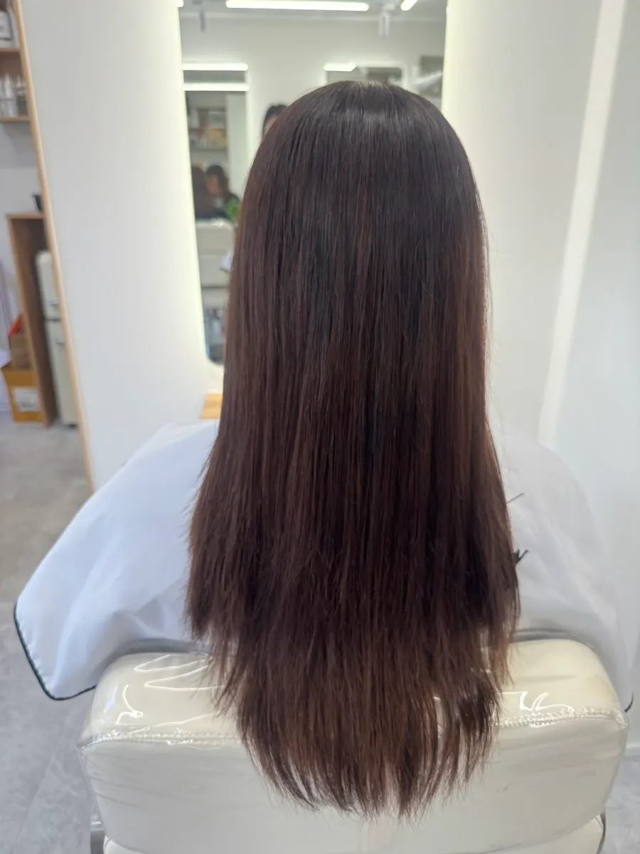 Full styled look after the straight perm and bangs volume treatment