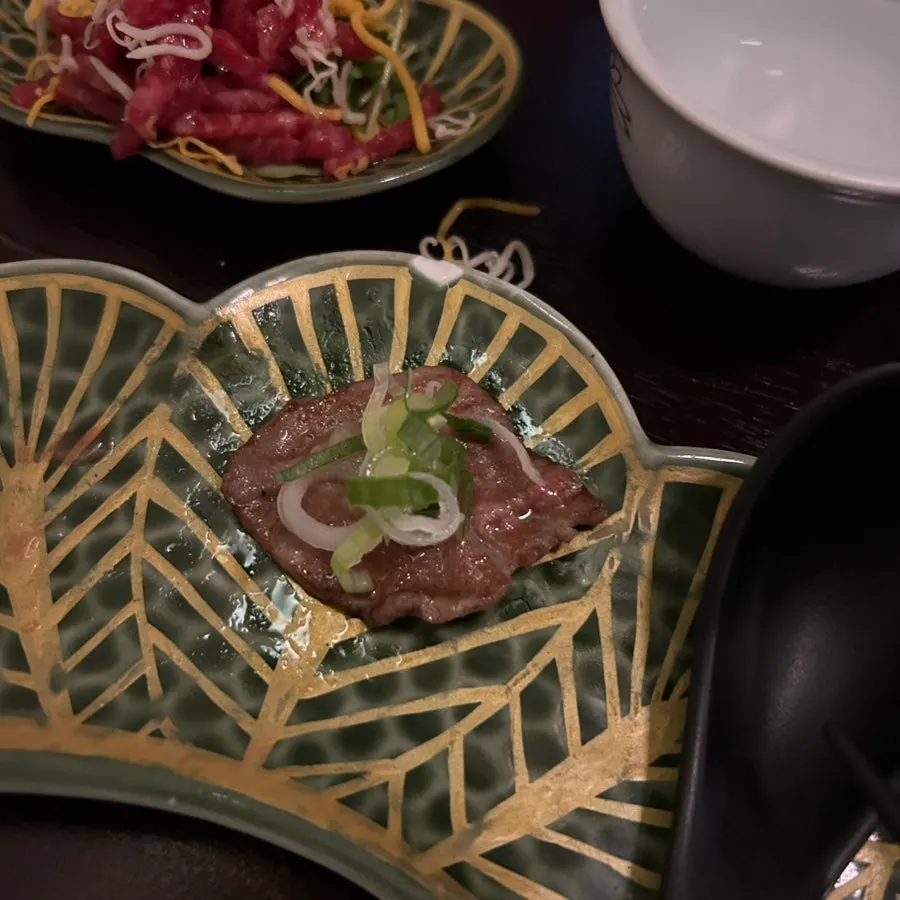 Sukiyaki-style beef dipped in egg yolk sauce