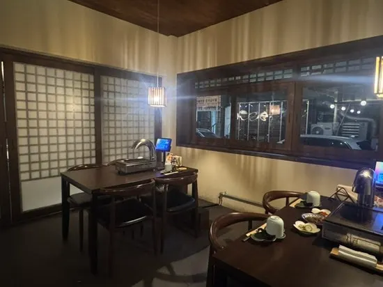 Interior with wood-toned decor and dim lighting
