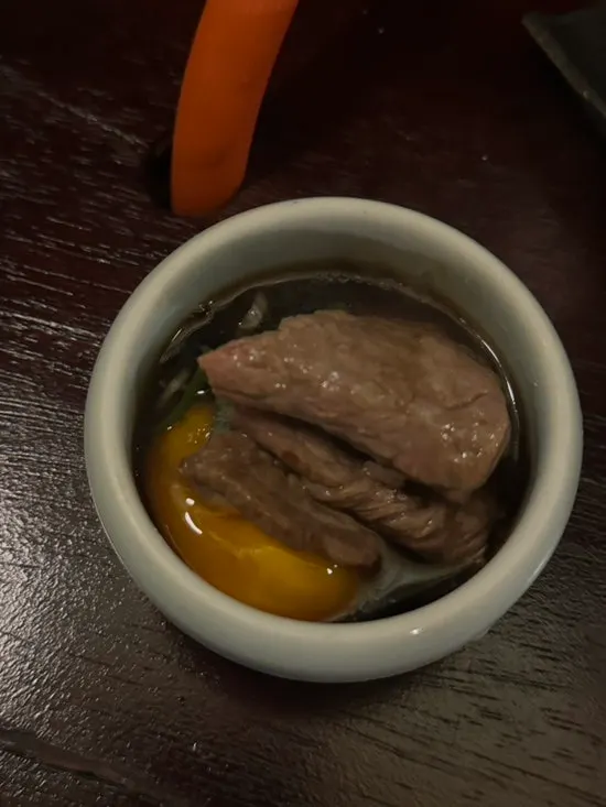 Premium pork loin dipped in special sauce and egg yolk