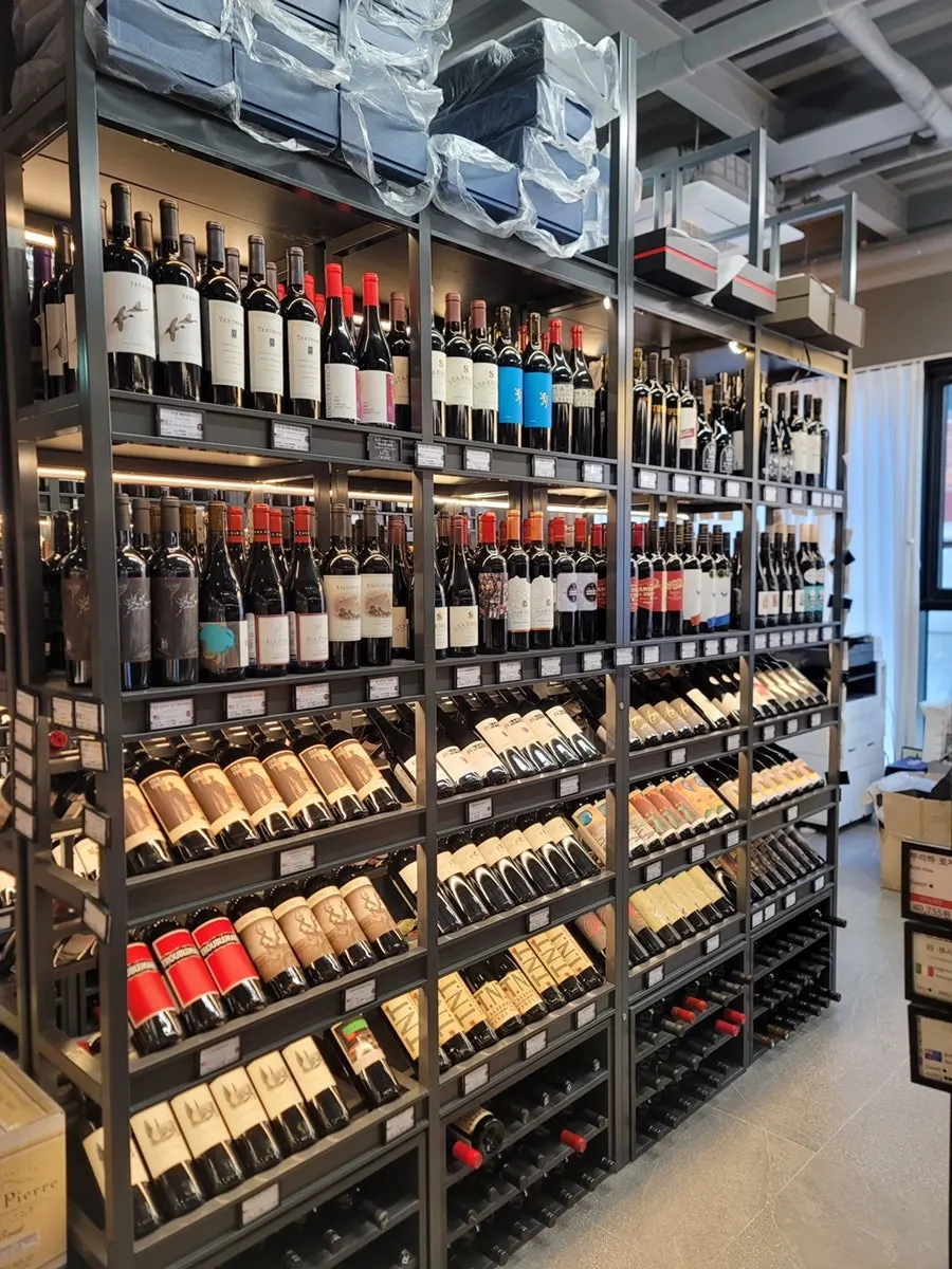 Inside the 1st-floor wine shop, choosing corkage wine