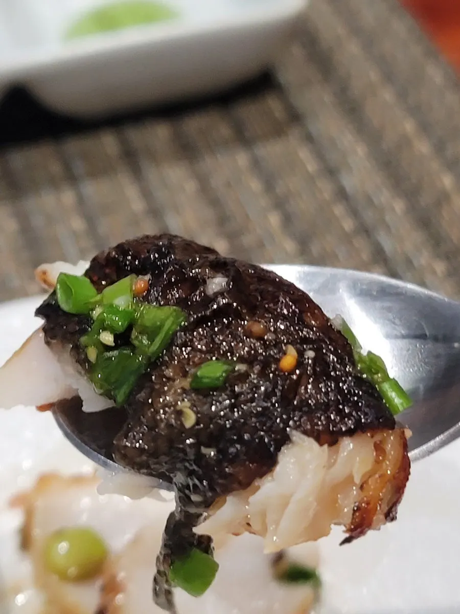 Tender sablefish flaking apart under the knife