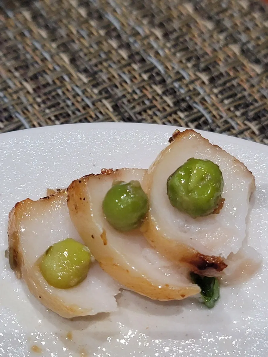 Pan-seared sablefish paired with green pea sauce
