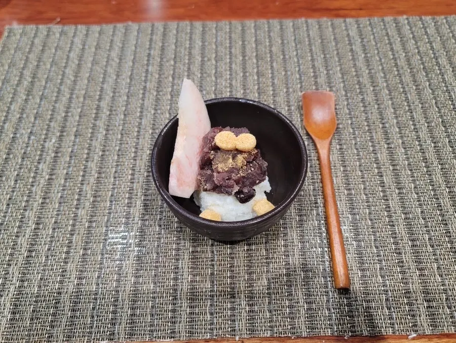 Red bean shaved ice topped over milk ice, closing out the course