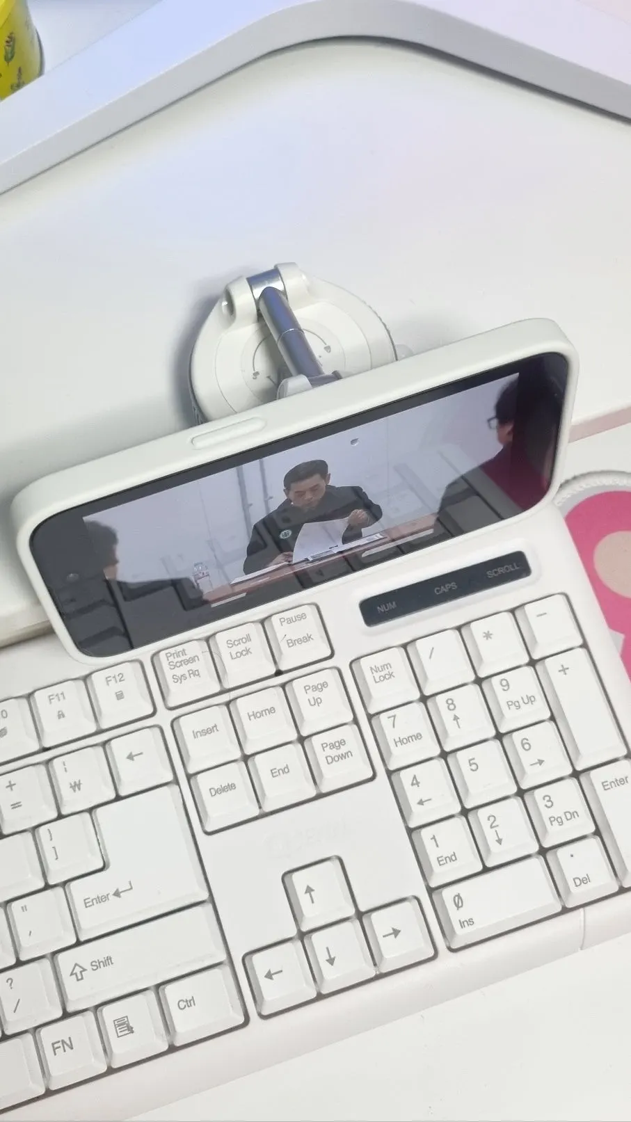 MagSafe mount used for filming at a desk