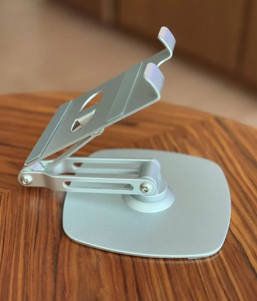 Using a tablet while looking for a height-adjustable stand