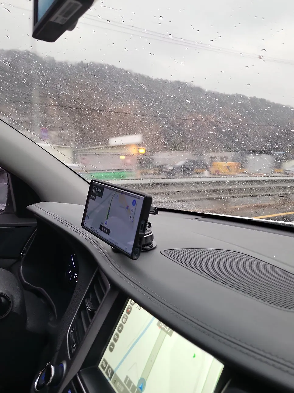 Dashboard mount holding a smartphone