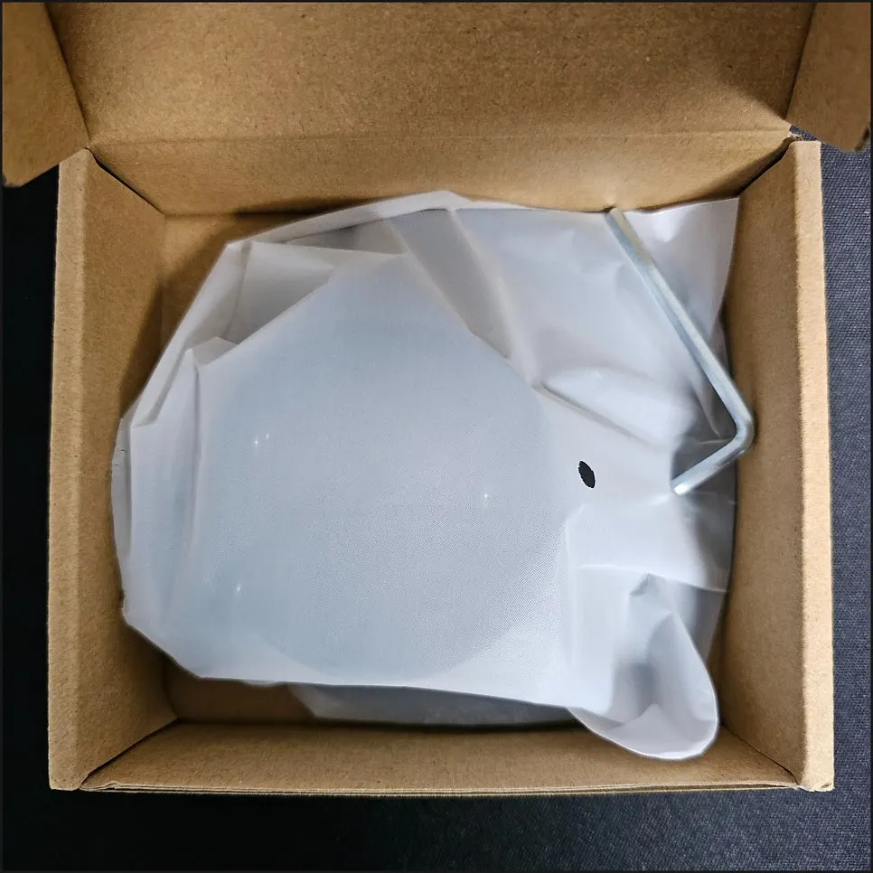 Plastic packaging and included items inside the Vitinya stand box