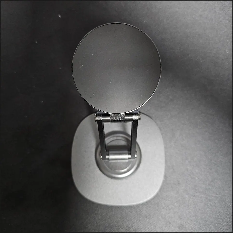 Stand adjusted to a height for placing a phone