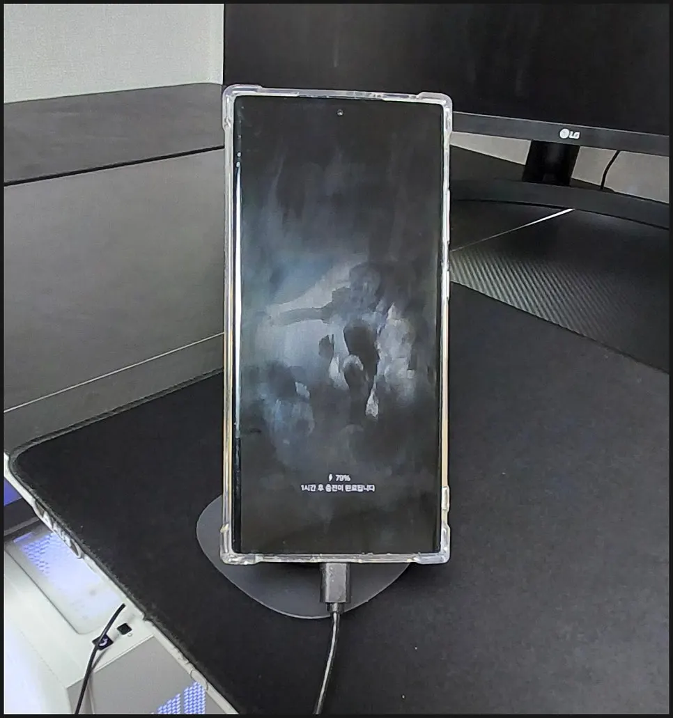 Phone standing on the stand while charging