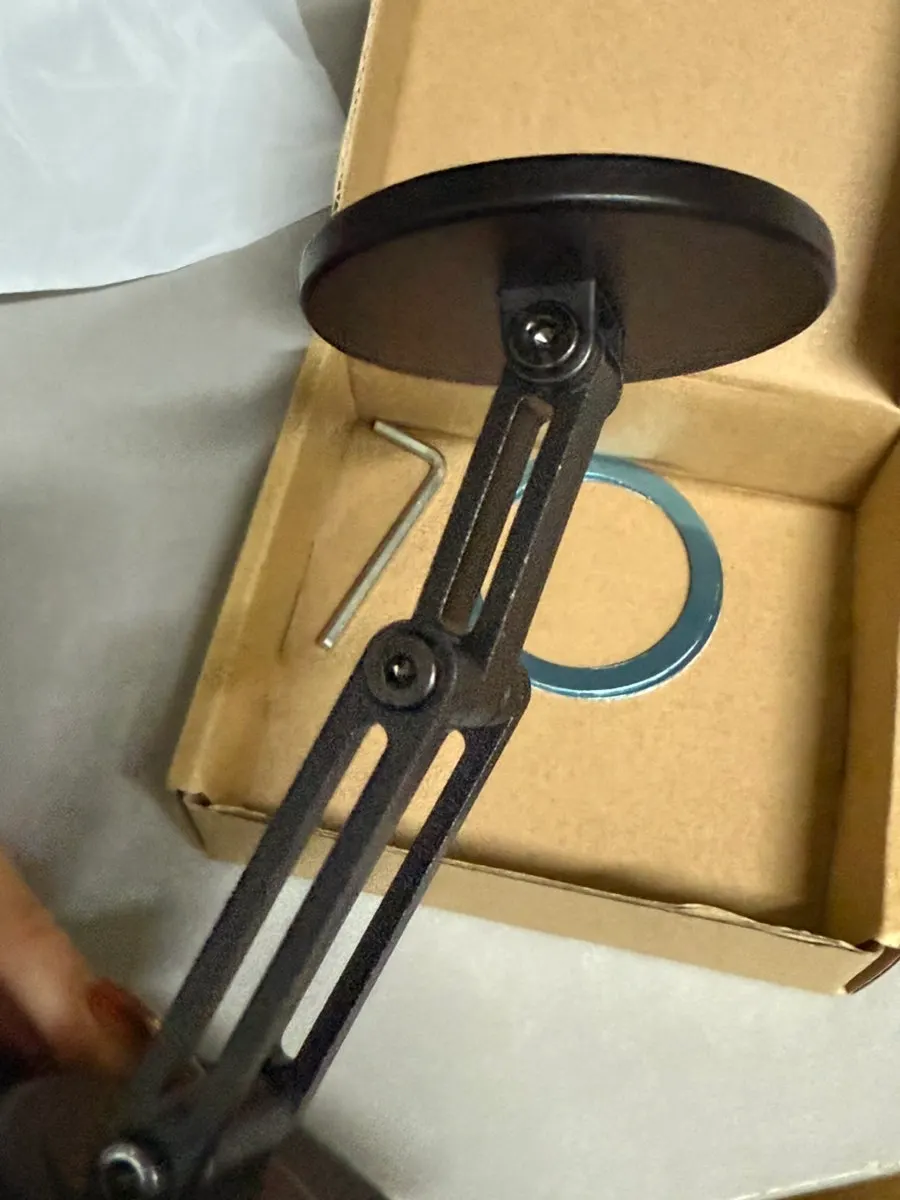 MagSafe stand used for watching videos on a desk