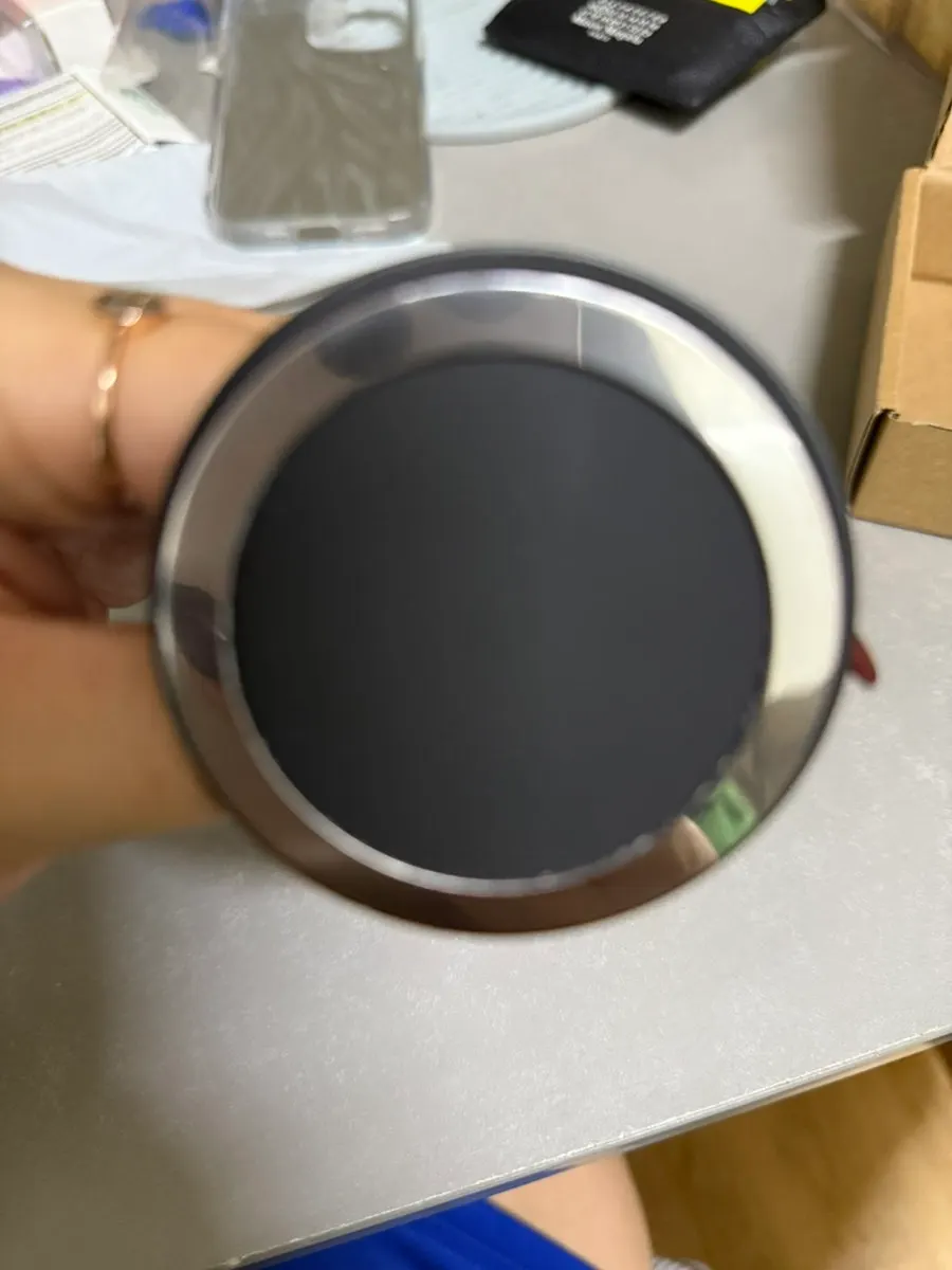 Mini desk setup with a wireless charging cable