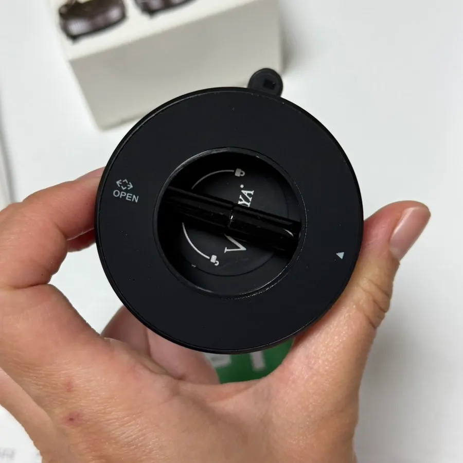 Circular pad attached to a flat dashboard
