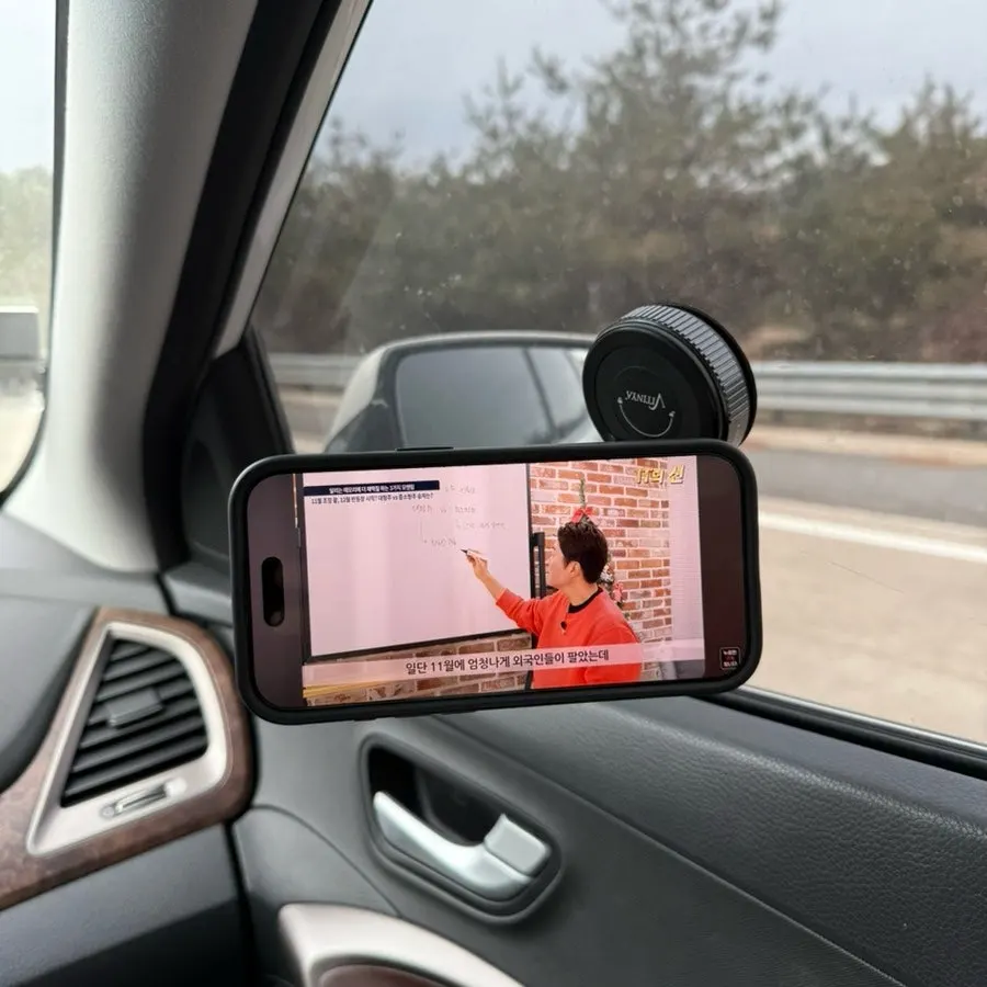 Suction mount used for passenger-side screen viewing