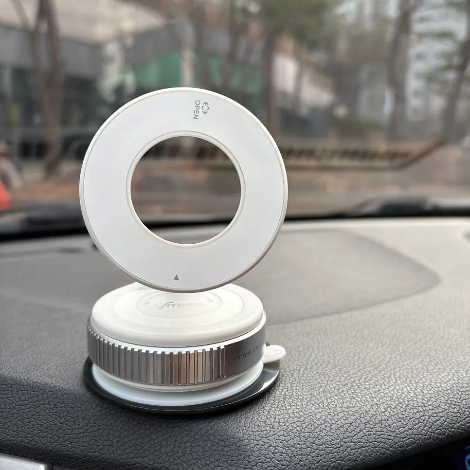 Car phone mount shown in motion