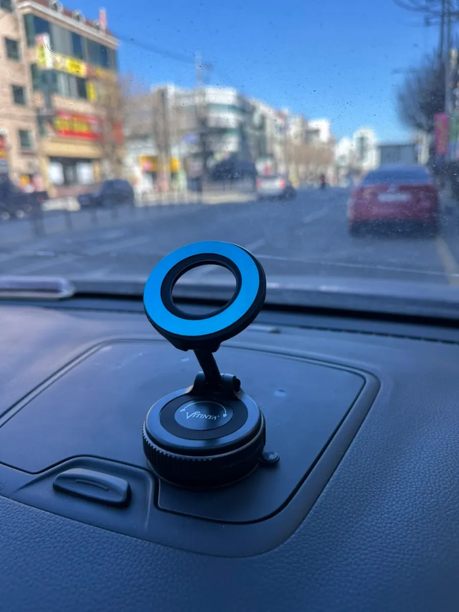 Phone mount attached to a desk for watching YouTube