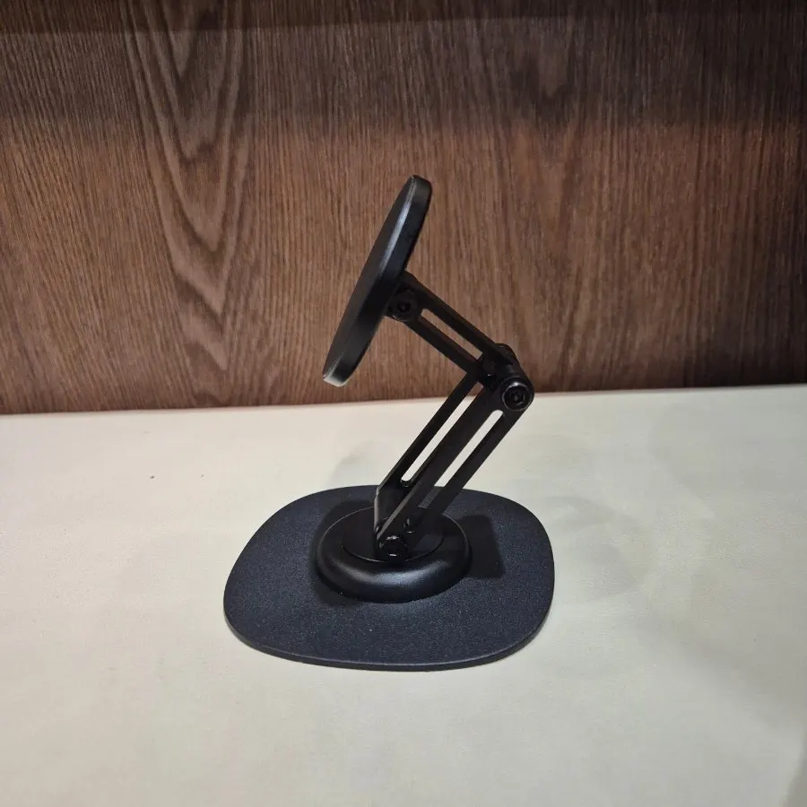 Stand contents including MagSafe rings and an adjustment tool