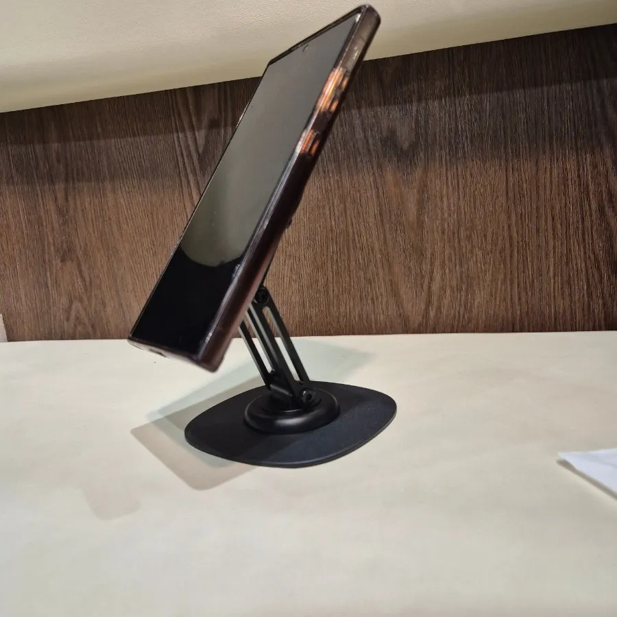 MagSafe stand holding a Galaxy S24 Ultra