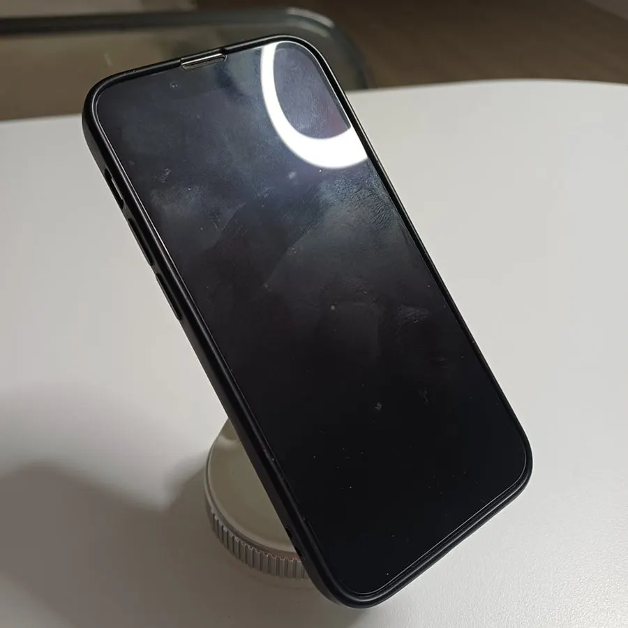 MagSafe phone mount standing on a table