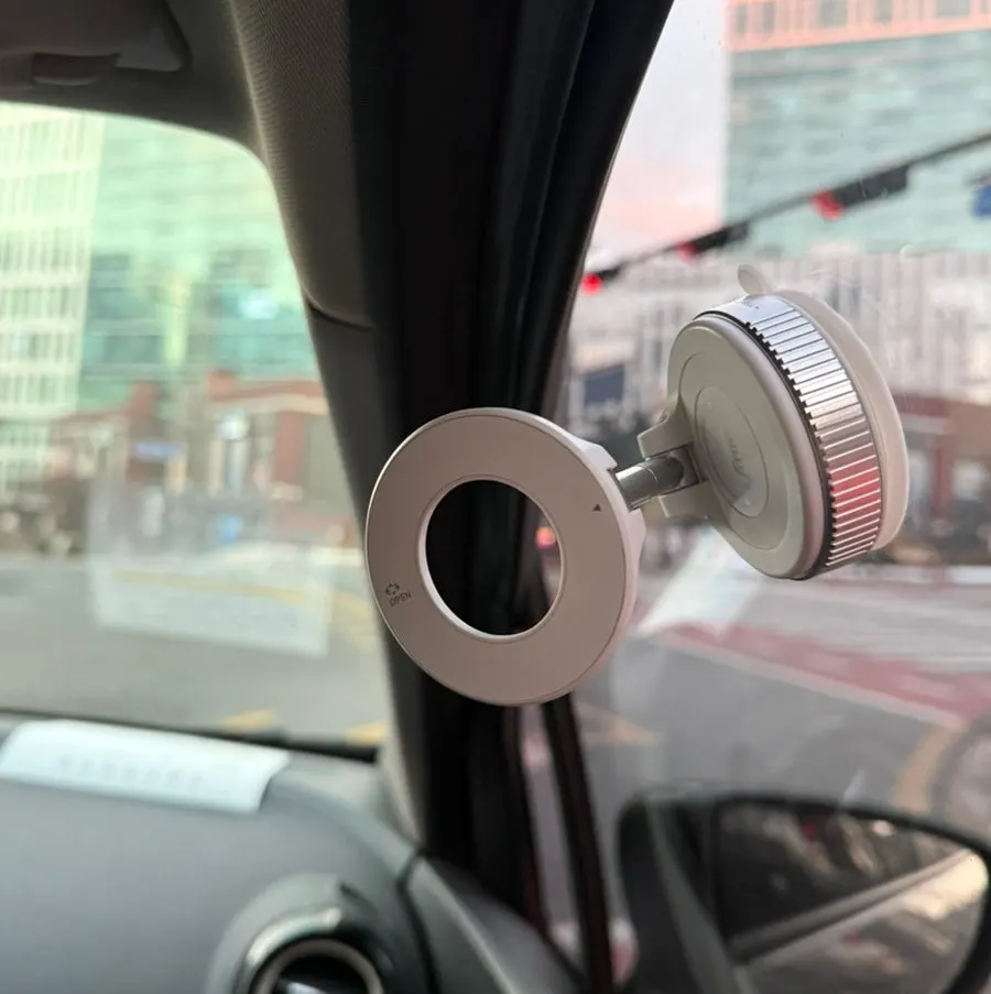 Phone mount installed on the passenger side of a car
