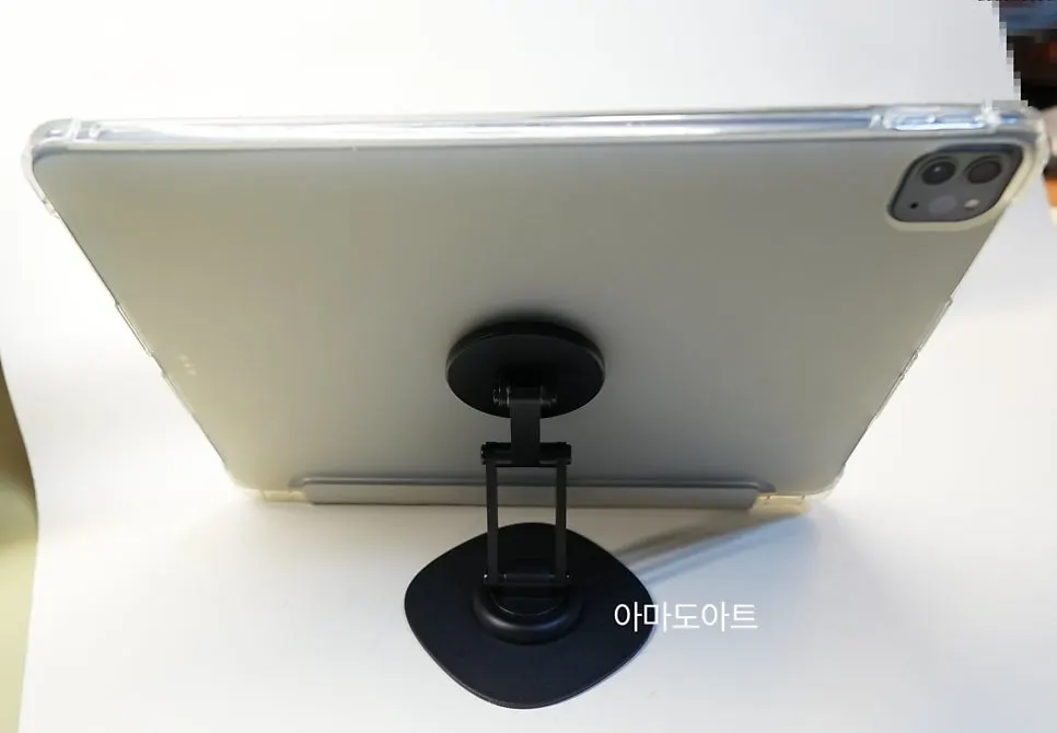 Magnetic attachment of a tablet and phone