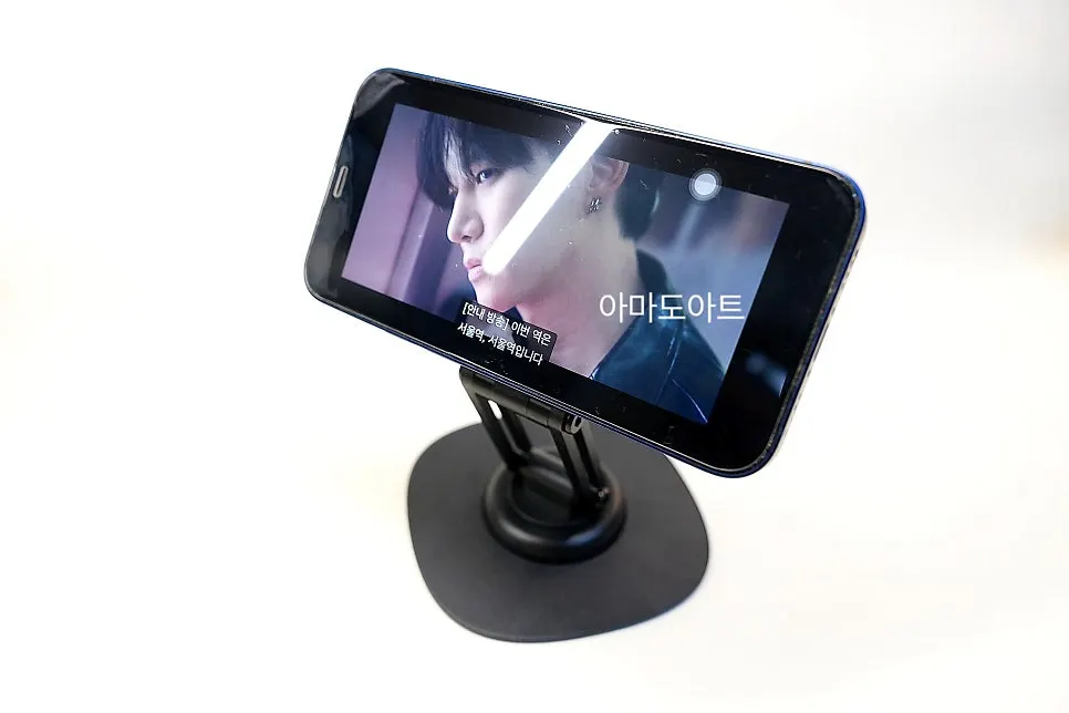 Matte black 360-degree rotating stand