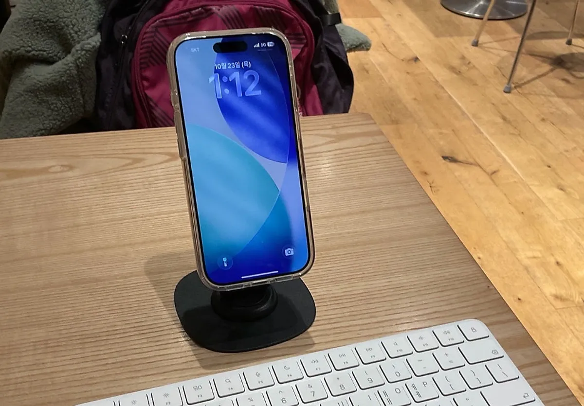 iPhone stand used with a keyboard