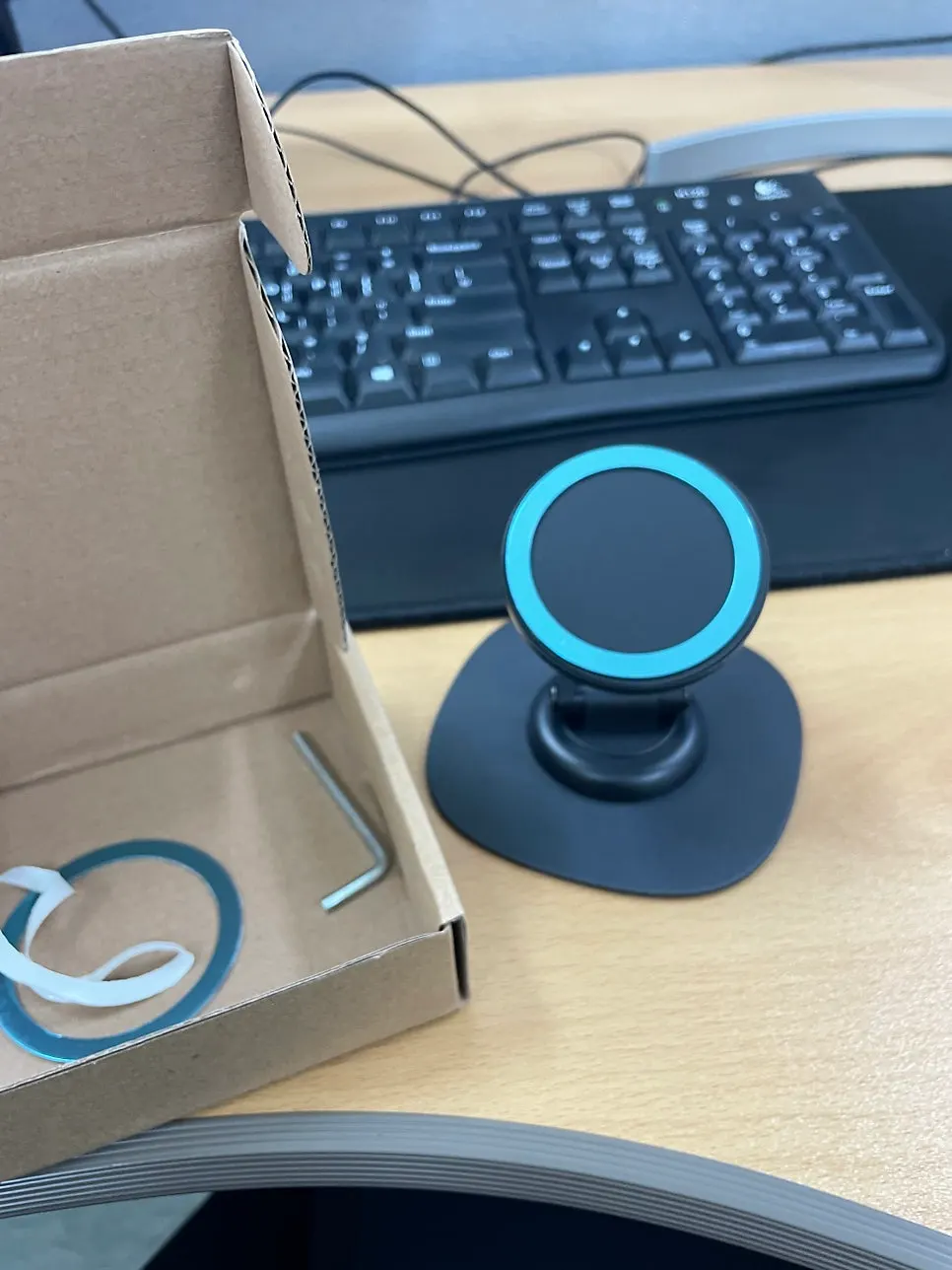 Desk setup holding a phone and tablet