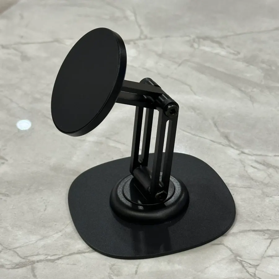 Magnetic stand for use on a table or beside a bed