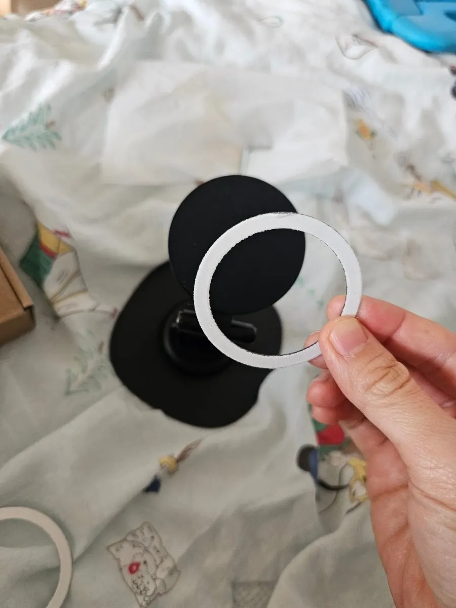 MagSafe stand with a smartphone attached