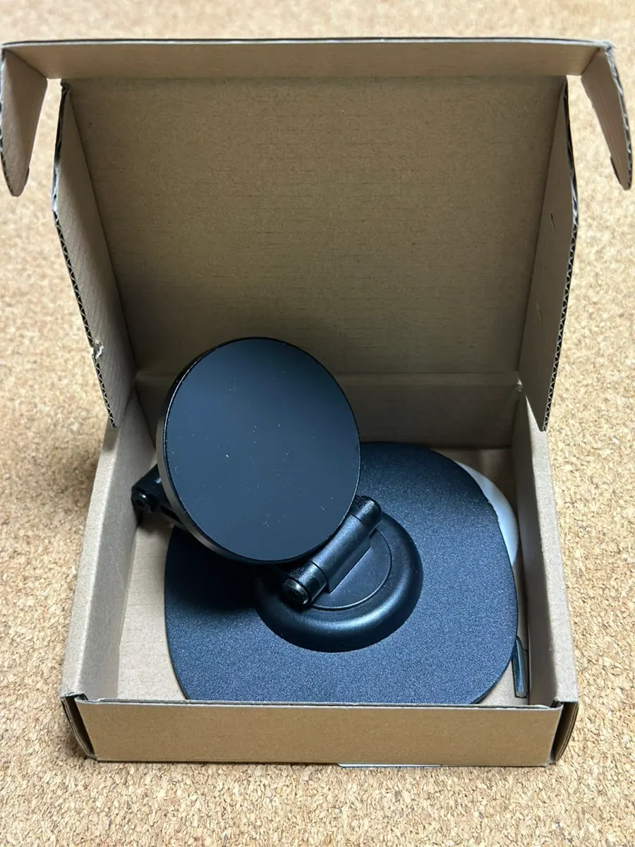 Phone stand holding a phone upright for watching videos