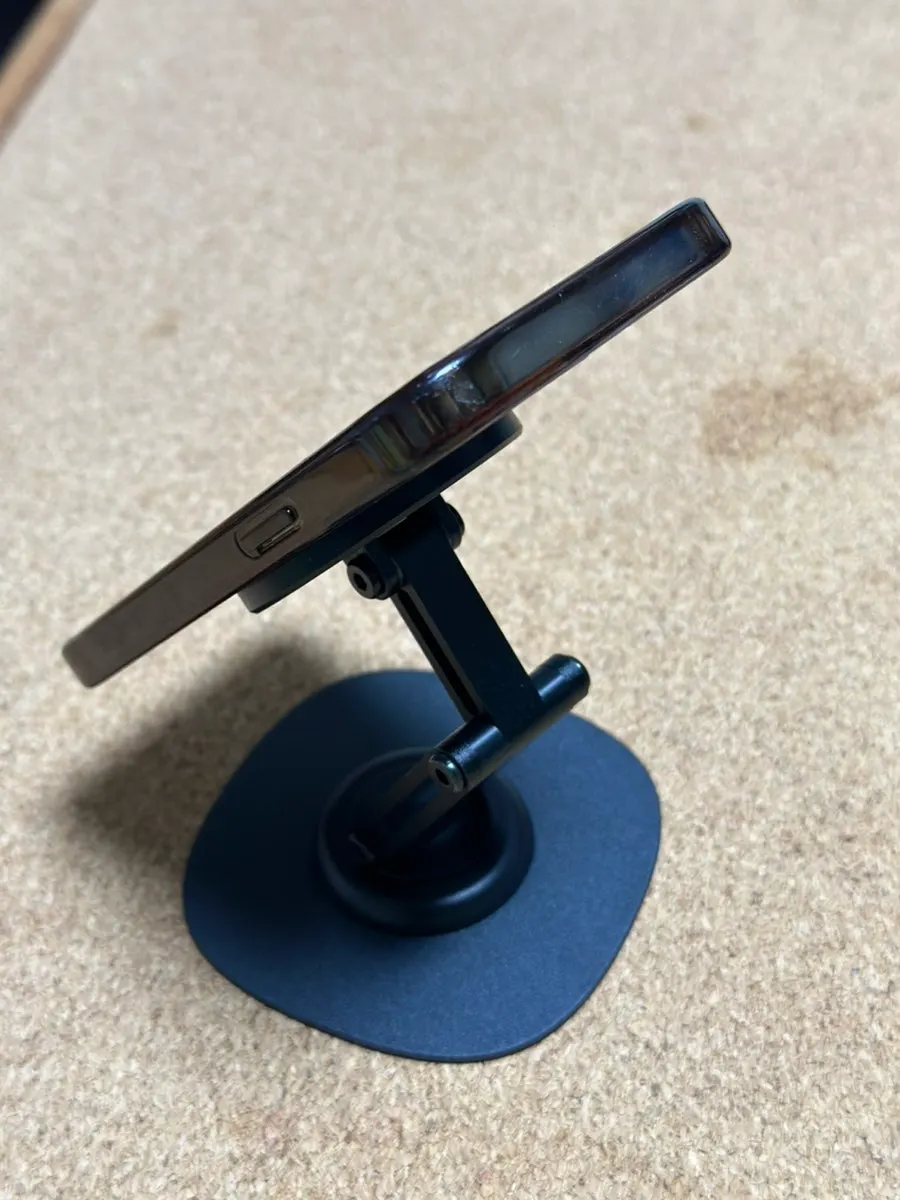 MagSafe phone stand attaching a phone magnetically