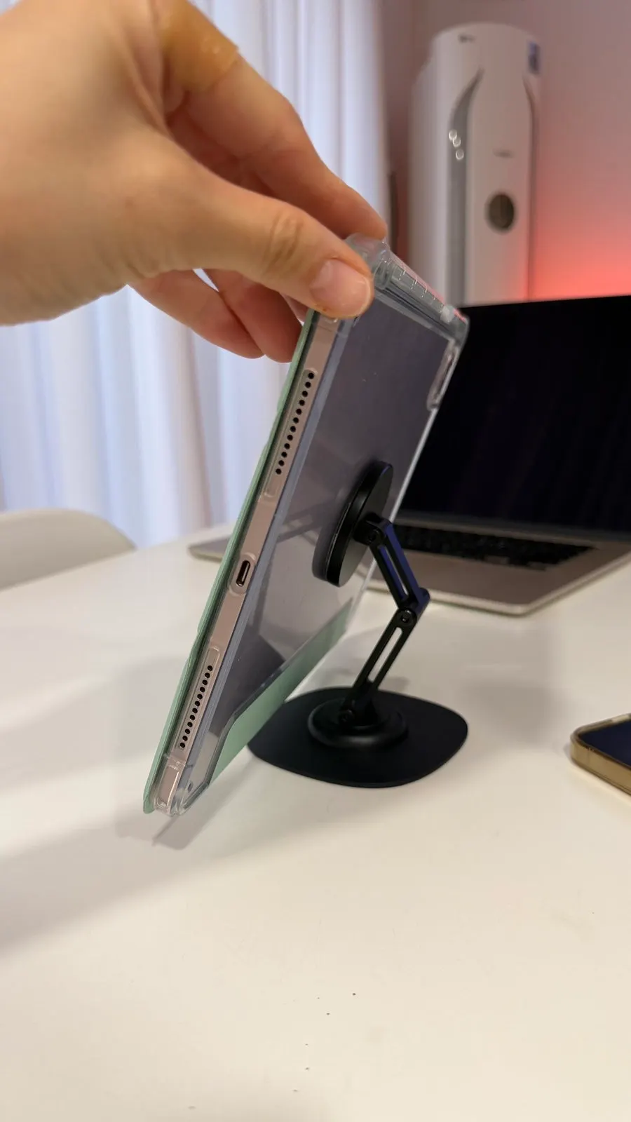 Stand with a sturdy base and rotation function