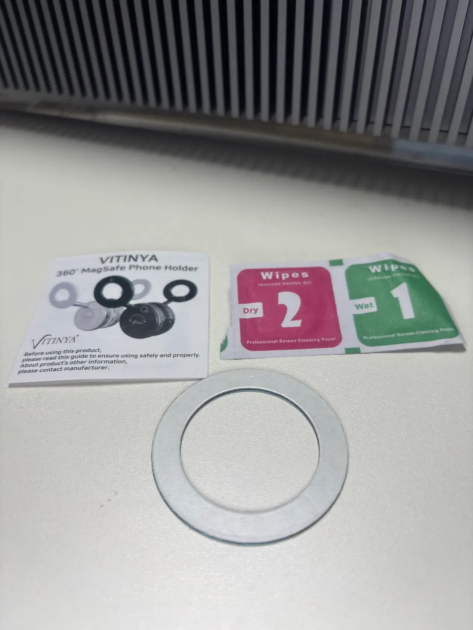 Instruction manual and cleaning-paper contents