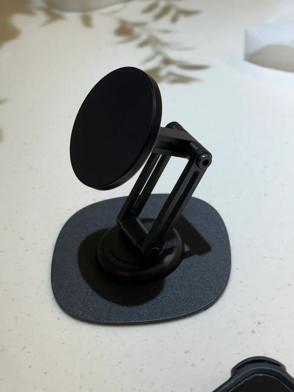 MagSafe stand photo showing 360-degree rotation