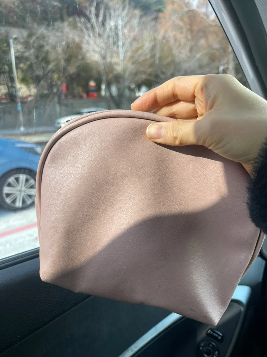 Holder carried inside a pouch