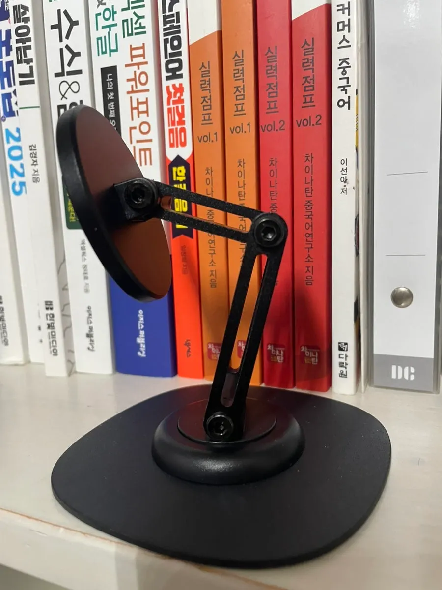 Stand in a black-toned interior