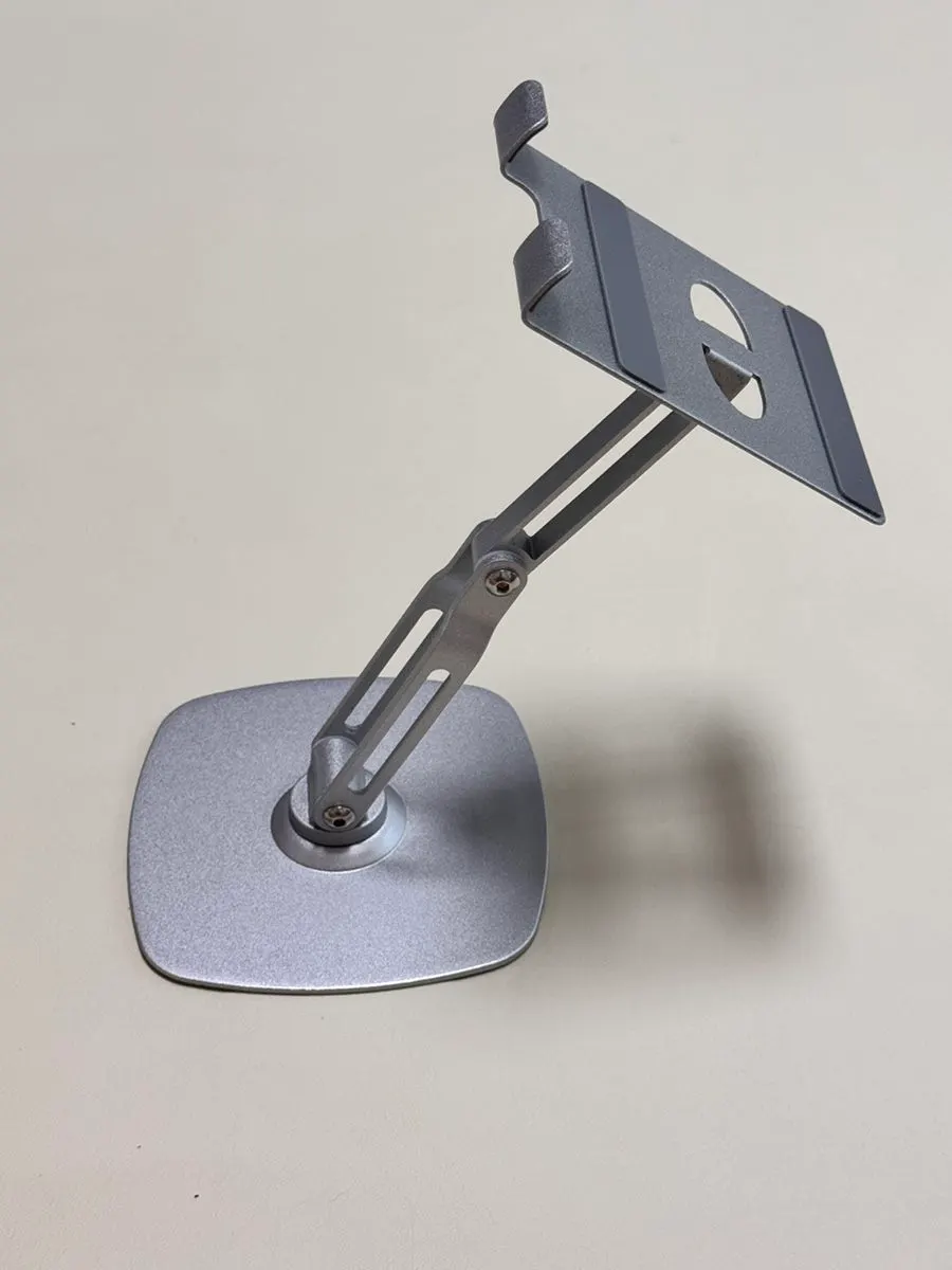 Metal stand holding a tablet securely