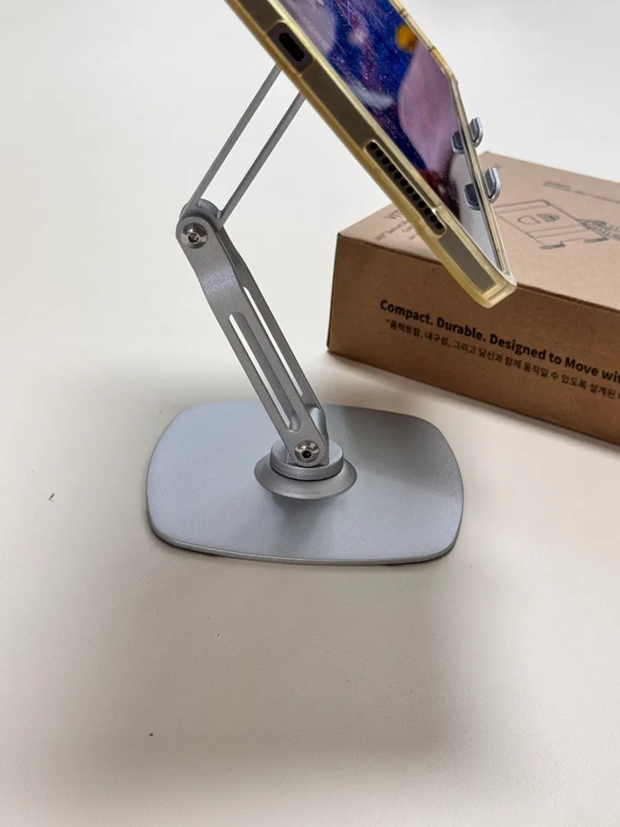 Tablet stand placed on a narrow table