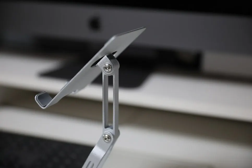 Tablet stand showing its height adjustment feature