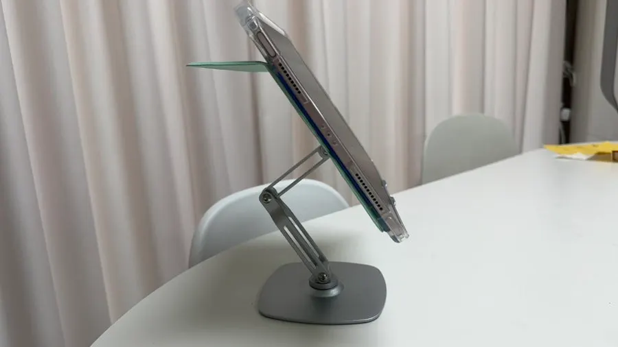 Three-section folding tablet stand in use